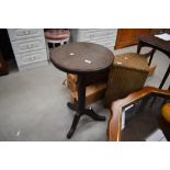 An oak pedestal table having twist column and triple splay legs, diameter approx. 43cm