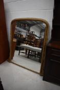 A gilt frame over mantel wall mirror , width approx. 103cm