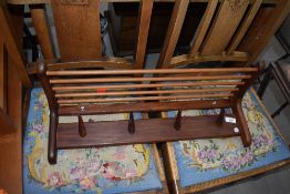 A vintage part teak coat and hat rack, width approx. 61cm