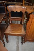 A 19th Century solid seat rail back dining chair