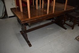 A mid 20th Century oak refectory style drawer leaf table, approx. 168 x 91cm, additional leaves each