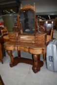 A Victorian burr walnut Duchess style dressing table , having six jewellery drawers plus wide