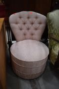 A vintage button back nursing chair