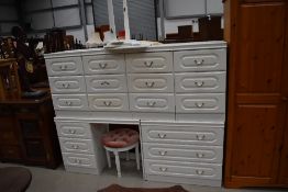 A large selection of white laminate bedroom furniture