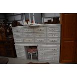 A large selection of white laminate bedroom furniture