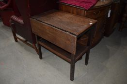 An early to mid 20th Century oak drop flap tea trolley (no castors)