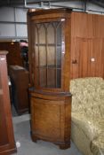 A reproduction burr walnut corner display , possibly Reprodux, height approx. 183cm