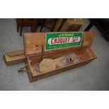 A vintage Croquet box (limited contents) and a projector screen