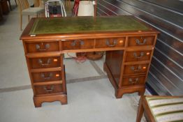A reproduction Regency style pedestal desk with skiver leather top, approx. 120 x 61cm