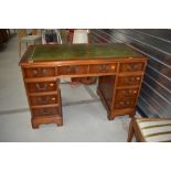 A reproduction Regency style pedestal desk with skiver leather top, approx. 120 x 61cm