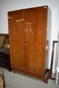 An early 20th Century mahogany wardrobe having semi fitted interior, approx. 108cm width including