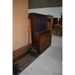 Two early 20th Century mahogany bed frames , look a nice heavy quality with flamed panels and cast