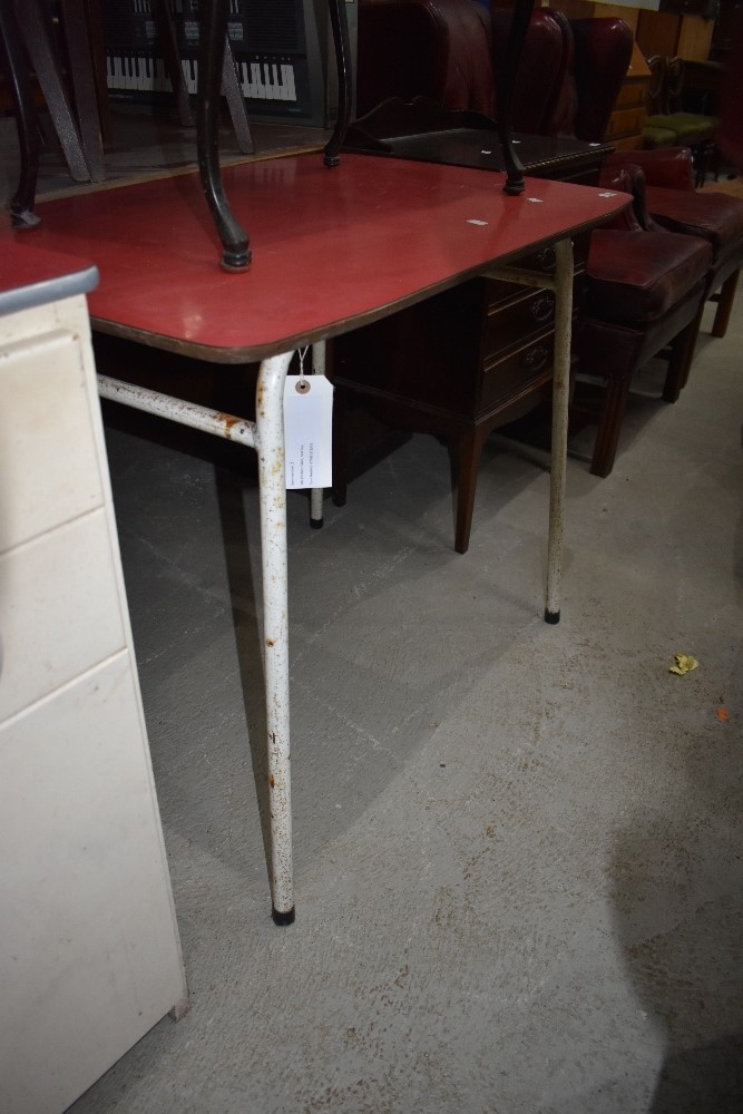 A vintage formica topped kitchen/utility table having metal frame, approx 91 x 61cm