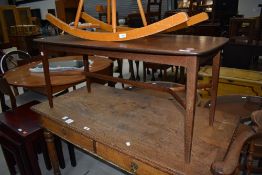 A vintage teak stylised coffee table, approx 104 x 49cm