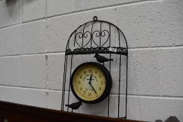 A modern garden style wall clock, aviary interest