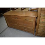 A modern golden oak sideboard/chest of three over two over two drawers, dimensions approx. W138cm