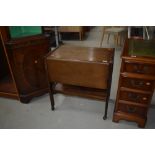 A traditional mahogany tea trolley, approx 66 x 41cm, with deep flaps and undershelf