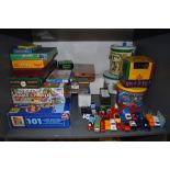 A shelf of modern Games and Toys including John Jaques Garden Quoits, Tomy Rumble inthe Jungle,