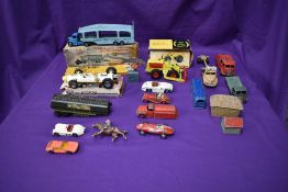 A selection of playworn diecasts including Dinky Supertoys Pullmore Car Transporter 982 with Ramp