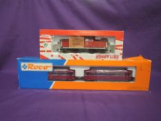 Two RoCo Ho scale, DB Livery Two Car Railbus, boxed 43018 and DB Livery Diesel Locomotive 290 101-5,