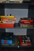 Two shelves of vintage Games including John Waddington Ltd Monopoly, Ariel Game Wembley, Denys
