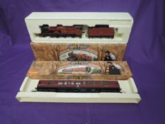 A Hornby 00 gauge Harry Potter 4-6-0 Loco & Tender, Hogwarts Castle 5972, boxed R2284 and a Hornby