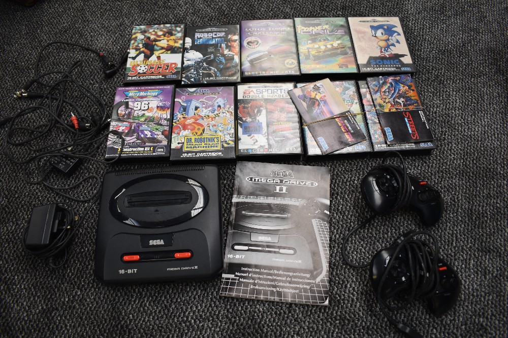 A Sega 16-Bit Mega Drive II Console with two controllers and 10 cartridges, Ultimate Soccer, Sonic