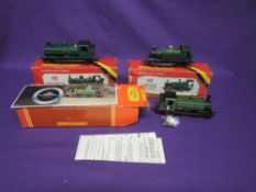 Three Hornby 00 gauge Tank Engines, GWR 0-6-0 8751, boxed R041, GNR 0-6-0 1247, boxed R396 and GWR