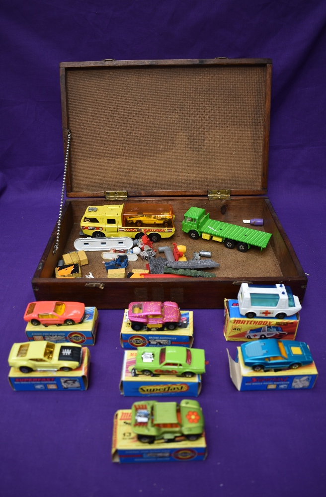 Seven Matchbox & Matchbox Superfast diecasts, Boss Mustang 44, Rat Rod Dragster 62, Baja Buggy 13,