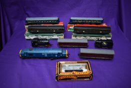A collection of 00/HO scale including Hornby diesel locomotive D6830, two French Hornby Coaches