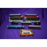 A collection of 00/HO scale including Hornby diesel locomotive D6830, two French Hornby Coaches