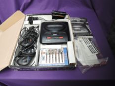 A Sega Mega Drive II 16-Bit Games Console with Sonic & Knuckles and Mega Games 6 games cartridges,