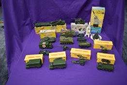A selection of Dinky Military playworn vehicles and accessories including Recovery Tractor, boxed