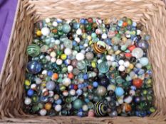 A large collection of mixed vintage glass marbles, various sizes, colourways and styles including