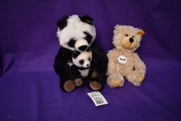Three modern Steiff Bears, Cha Cha Panda and Cub, having yellow tag and button in ear numbered