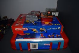 Two modern Meccano part sets, 7064 and Evolution 2 along with a Design Starter set and two Lego