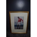 A framed print, Stanley Mathews bearing Signature and Best Wishes in black marker pen, framed size