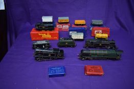 A collection of Hornby Dublo Three Rail including a 4-6-2 Loco & Tender Duchess of Montrose, a 2-6-4