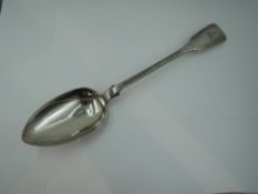 A Victorian silver basting spoon of fiddle back pattern bearing pineapple crest to terminal, Chester