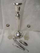 A large HM silver candle stick having tapered column and weighted base, Birmingham hallmarks date