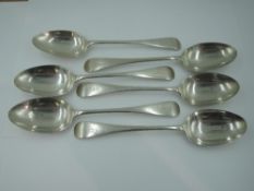 Six Edwardian silver dessert spoons of plain form bearing monogram G to terminals, Chester 1906,