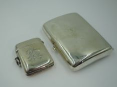 An Edwardian silver cigarette case of plain form, Chester 1903, William Neale, with presentation