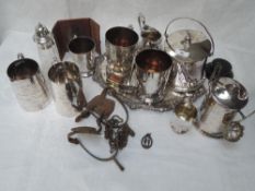 A small selection of silver plate including five trophy tankards bearing presentation inscriptions