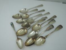 Eight assorted Georgian silver teaspoons including a matched set of six having bright cut