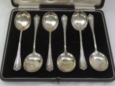 A cased set of six silver soup spoons having moulded decoration to terminals, London 1919, Josiah