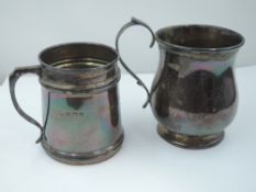 A small silver christening mug of baluster form bearing monogram to front, London 1919, makers