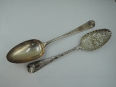 A Georgian silver berry spoon having frilled rim to bowl and later chased stem, London 1749,