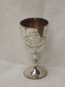 An Edwardian silver goblet trophy with stand, having inscription regarding East Riding of
