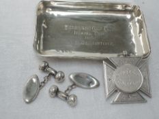 A small HM silver trinket dish of rectangular form having roll over rim and presentation inscription