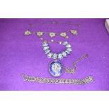 A small selection of white metal jewellery including filligree necklace, Greek key bracelet and